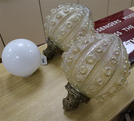 A pair of glass light fittings length approx. 37cm
